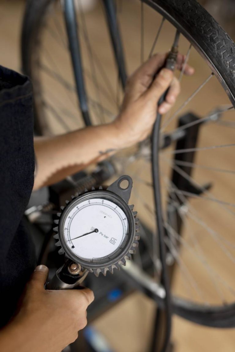 close-up-worker-checking-wheel