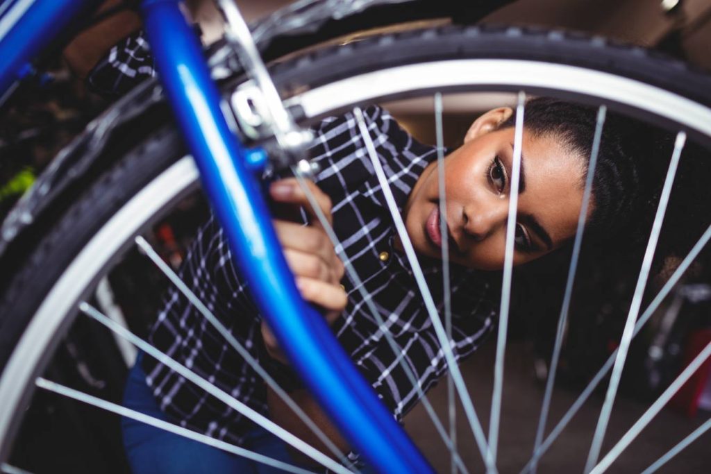mechanic-repairing-bicycle