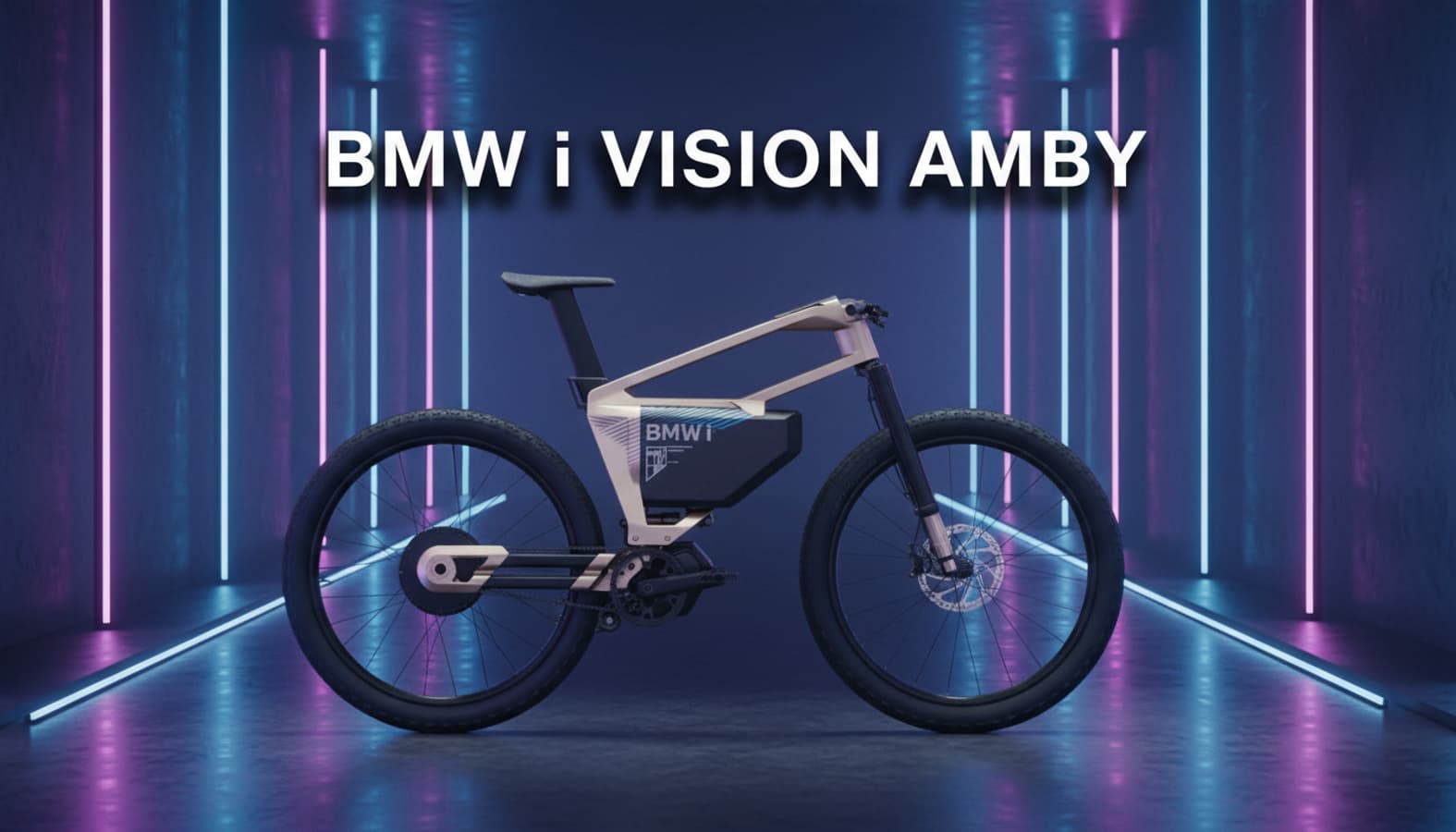 Prototype électrique BMW i Vision AMBY aux pneus larges stationné dans un studio futuriste aux néons colorés avec l'inscription textuelle du modèle.